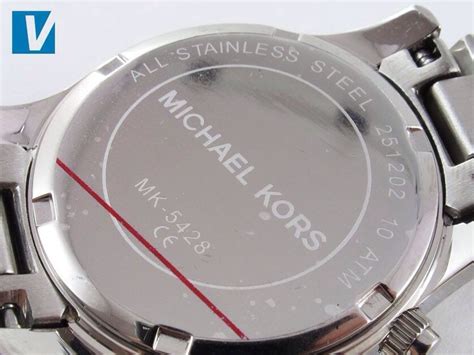 michael kors uhr garantieheft echt vs fake|check for michael kors watches.